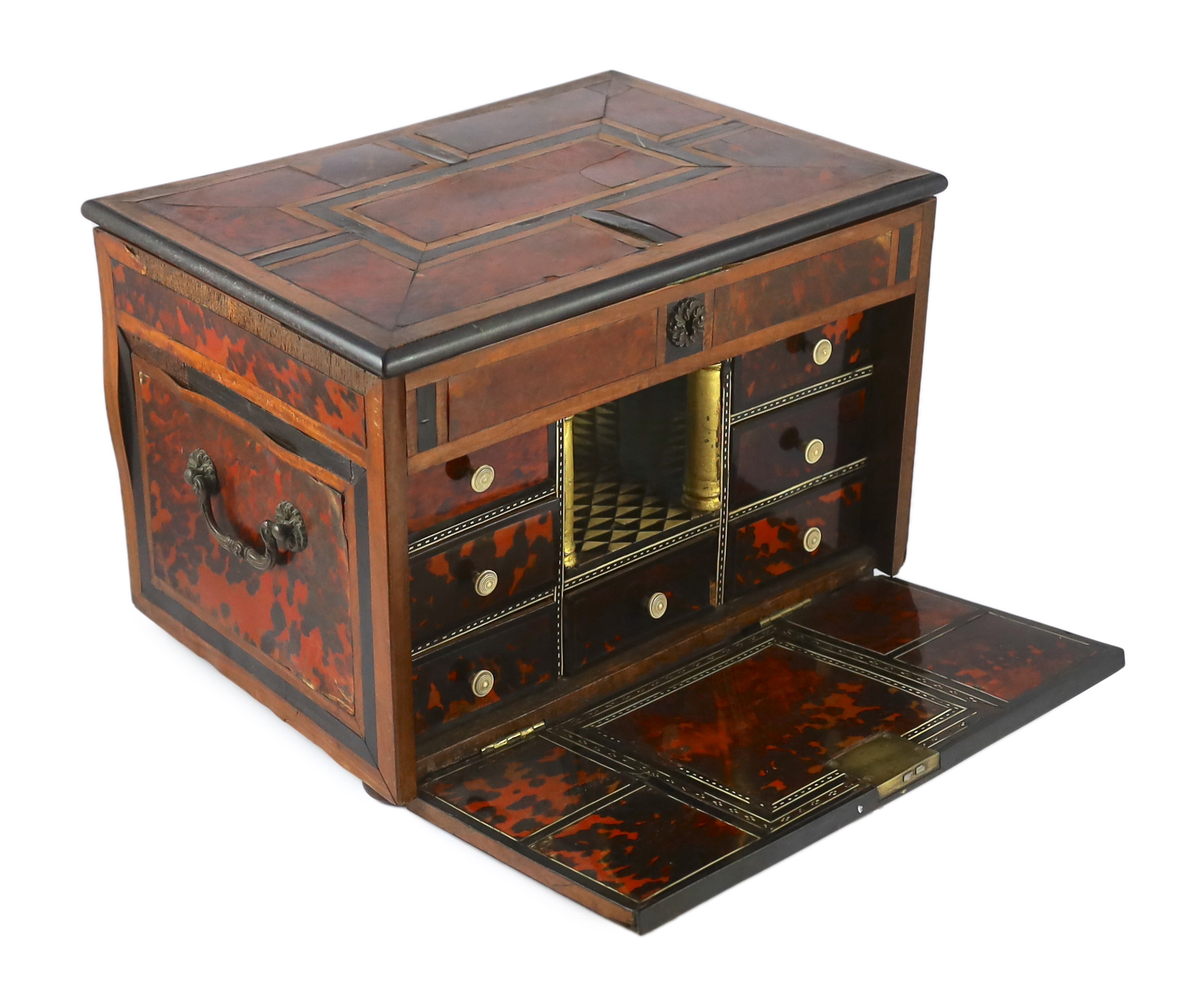 An early 18th century Indo Portuguese ebony, satinwood and red tortoiseshell travelling case, 42cm wide, 30cm deep, 29cm high. Ivory submission reference: YHDD1FSF